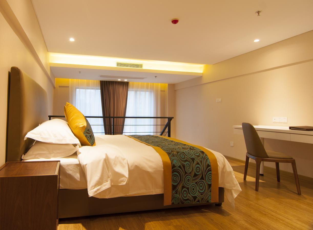 Home Plus Suite Hotel And Apartment Wuhan Esterno foto