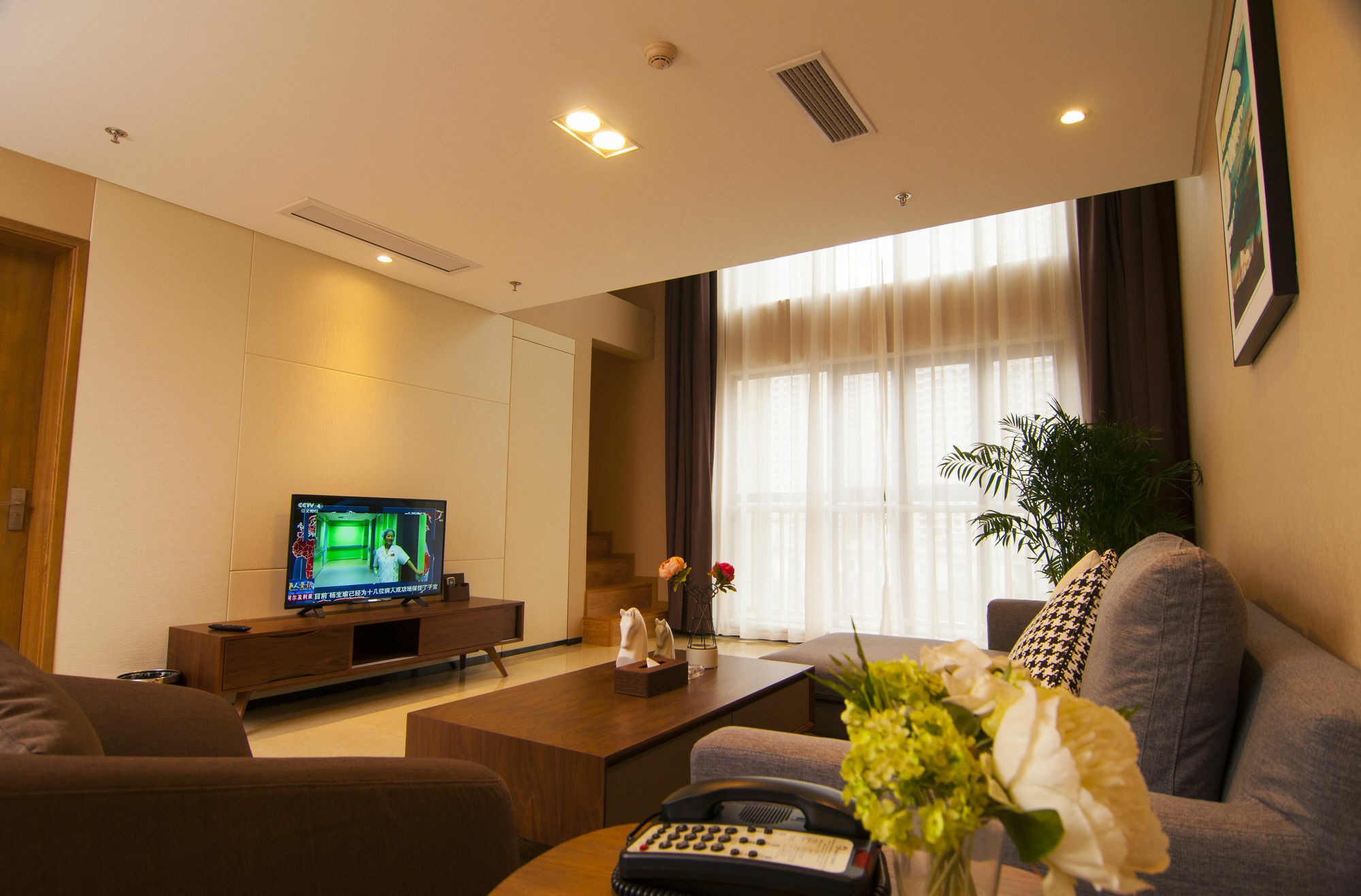 Home Plus Suite Hotel And Apartment Wuhan Esterno foto